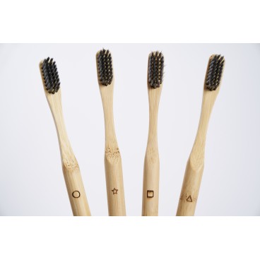 Irisana activated carbon toothbrush. Box of 4 units